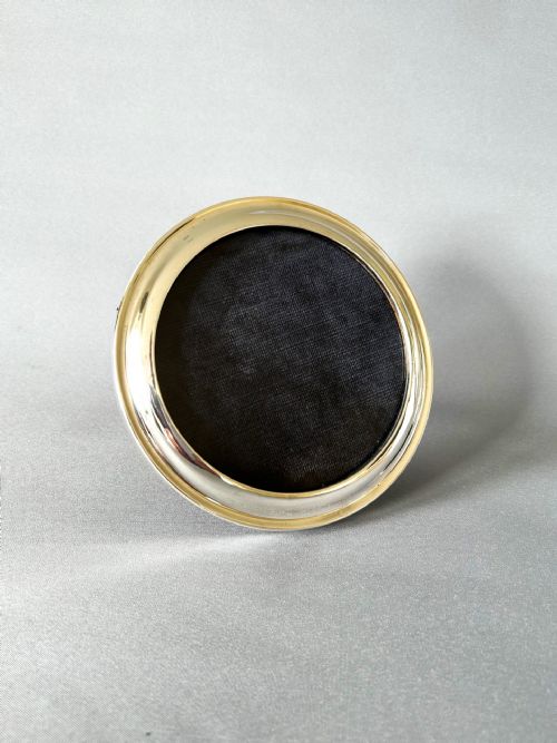 A Circular Silver Photo Frame