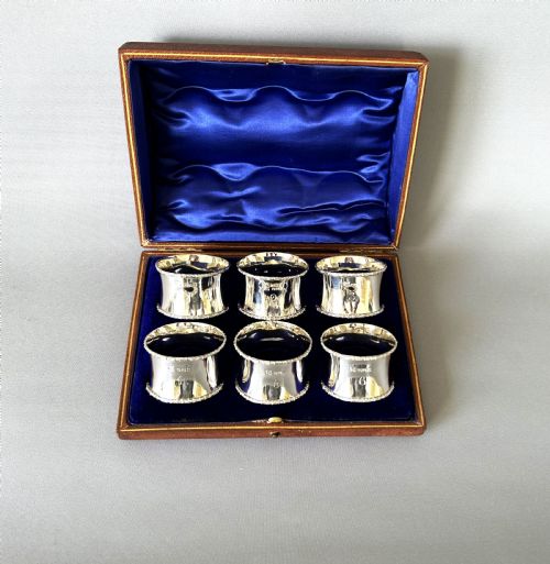 fig 1. A handsome set of 6 boxed and numbered silver napkin rings