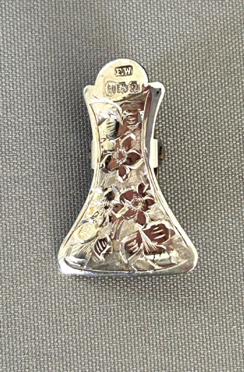 An Unusual Shape George V Silver Napkin Clip