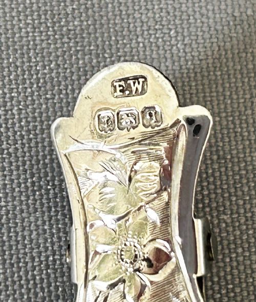 fig 1. An unusual shape George V silver napkin clip