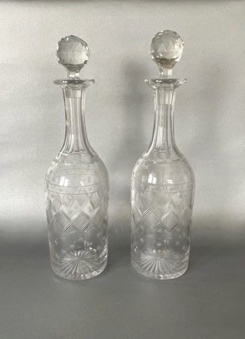 An Unusual Pair of Victorian Star Etched Wine Bottles
