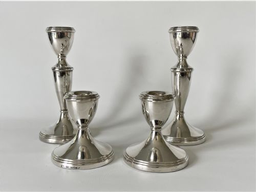 fig 1. An unusual set of 4 hallmarked silver candlesticks