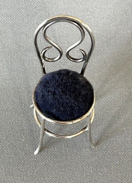 fig 1. An unusual Victorian silver salon chair pin cushion