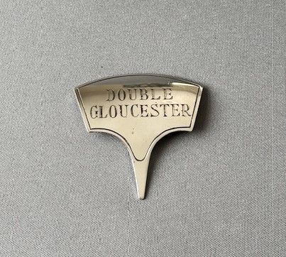 fig 1. A rare hallmarked silver Double Gloucester cheese ticket