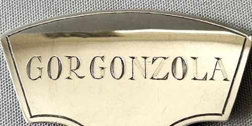 fig 1. A rare hallmarked silver Gorgonzola cheese ticket