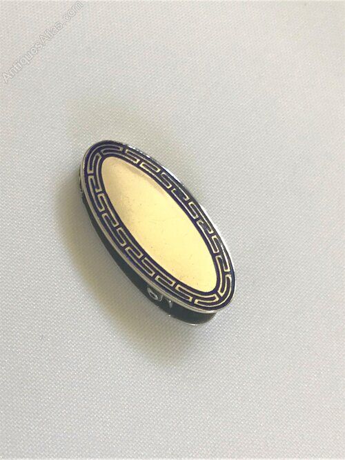 fig 1. An unusual French silver & enamel napkin clip