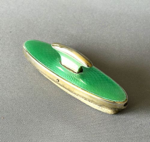 fig 1. An Art Deco silver & guilloche enamel nail buffer