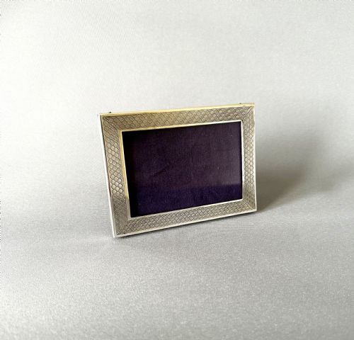 A Small Silver Landscape/portrait Photo Frame