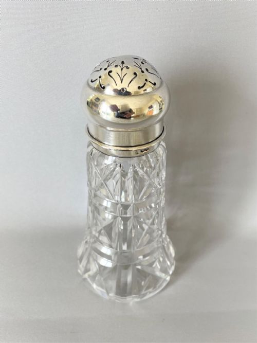 fig 1. An Art Deco silver and cut glass sugar caster