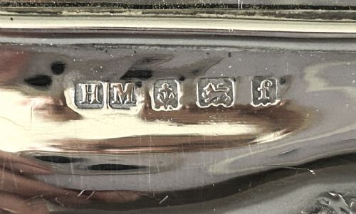 fig 1. A handsome Edwardian silver table mirror