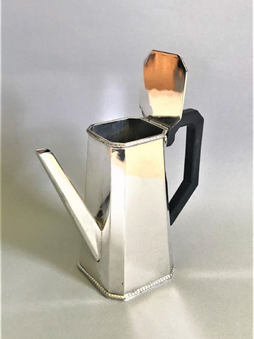fig 1. An Art Deco silver plated chocolate pot