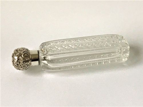 An Edwardian Silver Mounted Cut Glass Scent Bottle