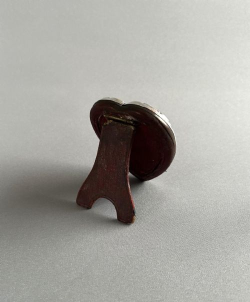 fig 1. A miniature heart shaped silver frame
