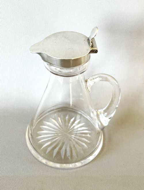 fig 1. An Edwardian silver mounted Whisky tot