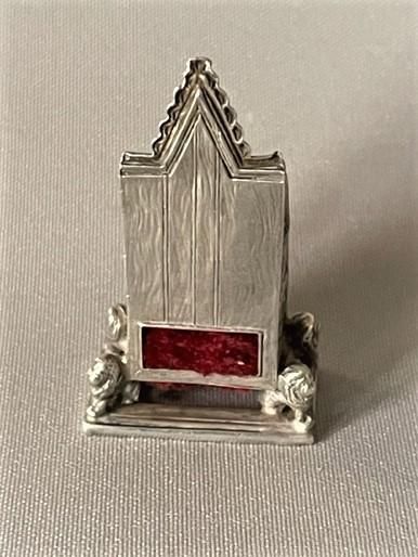 fig 1. An Edwardian coronation chair silver pincushion