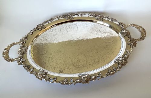 A SUBSTANTIAL EDWARDIAN SILVER PLATED TEA TRAY