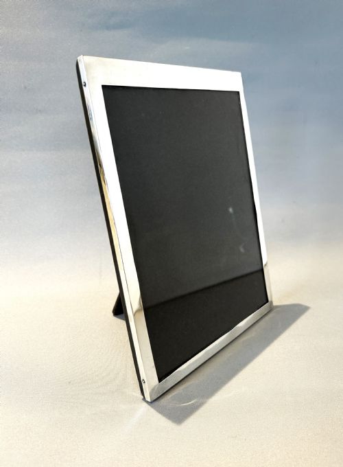 fig 1. A large Art Deco period silver photo frame