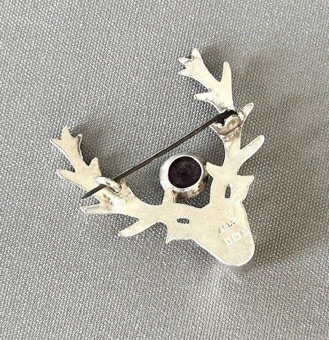 fig 1. Hallmarked silver & amethyst stags head brooch