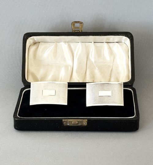 fig 1. A stylish pair of Art Deco boxed silver napkin rings