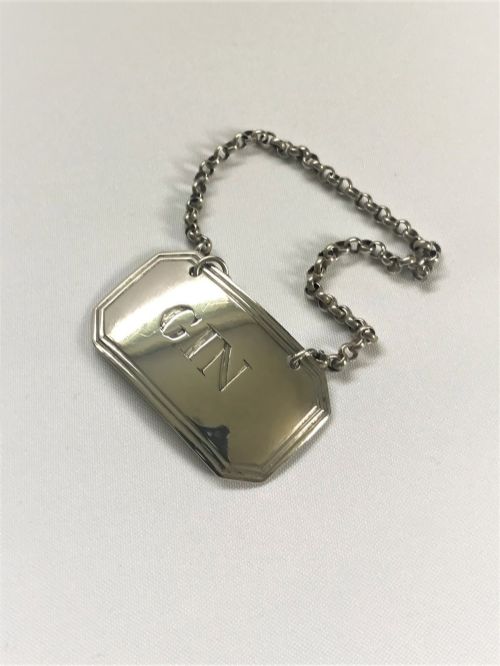 fig 1. A Rare Transitional hallmark Victorian silver Gin label