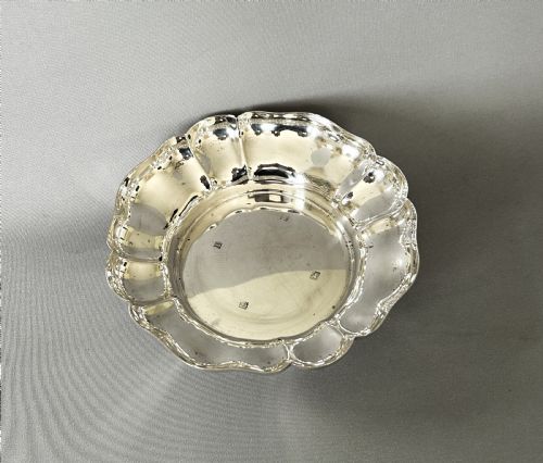 fig 1. A handsome vintage silver wine bottle/decanter coaster