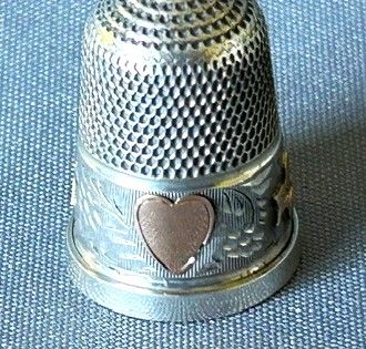 fig 1. A rare Chester silver & 9ct gold cased thimble