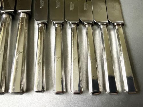 fig 1. An extremely rare set of 12 Georgian silver handled knives