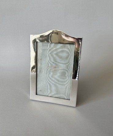 A Goldsmiths & Silversmiths Silver Photo Frame
