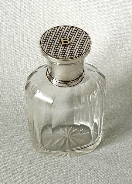 fig 1. An Art Deco German silver mounted toilet water bottle