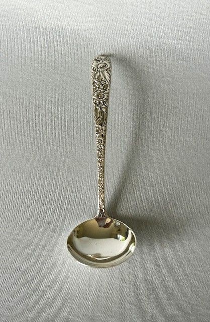 fig 2. A sterling silver cream ladle by S. Kirk & Sons