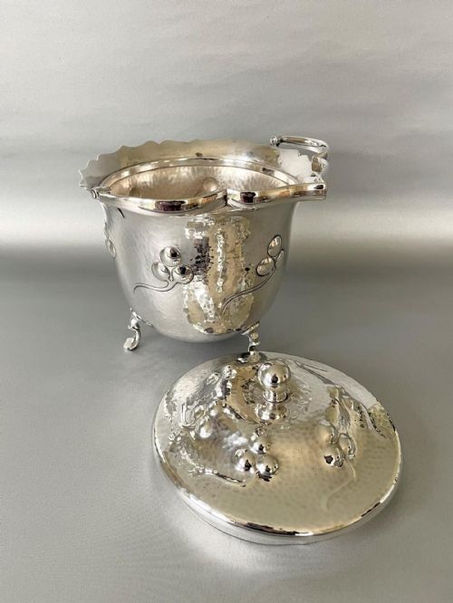 fig 1. A stunning Arts & Crafts silver plated biscuit barrel