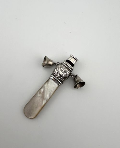 fig 1. A George V Chester silver whistle/rattle combo
