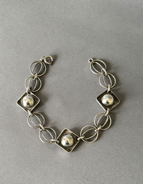 AN AUSTRIANGERMAN ART DECO PANEL LINK SILVER BRACELET
