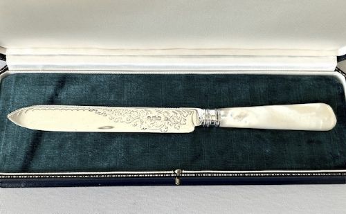 fig 1. A superb boxed Victorian silver & mother-of-pearl wedding cake knife