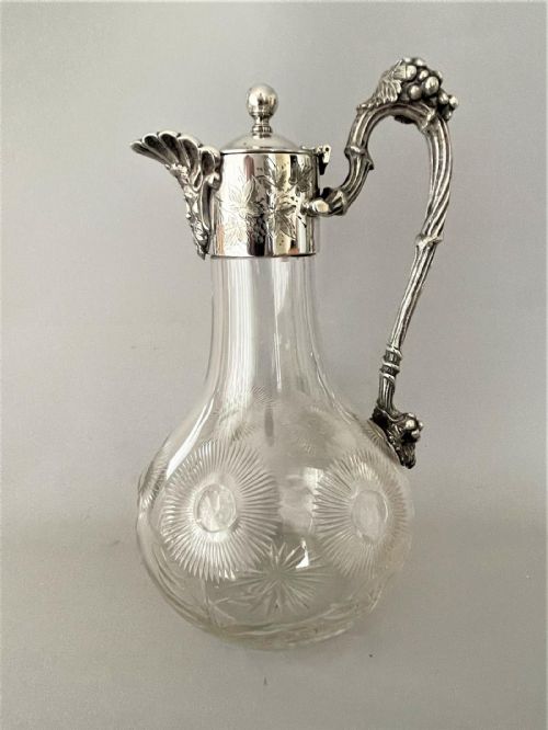 A WONDERFUL VICTORIAN SILVER PLATED CUT GLASS CLARET JUG
