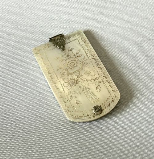 A MID VICTORIAN SILVER MOTHEROFPEARL BONE AIDE MEMOIRE