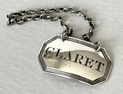 A HANDSOME GEORGIAN SILVER CLARET LABEL