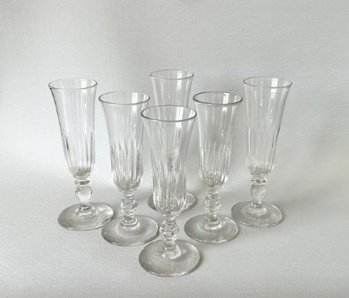 A Matched Set of Late Victorian Gut Glass Champagne Flutes