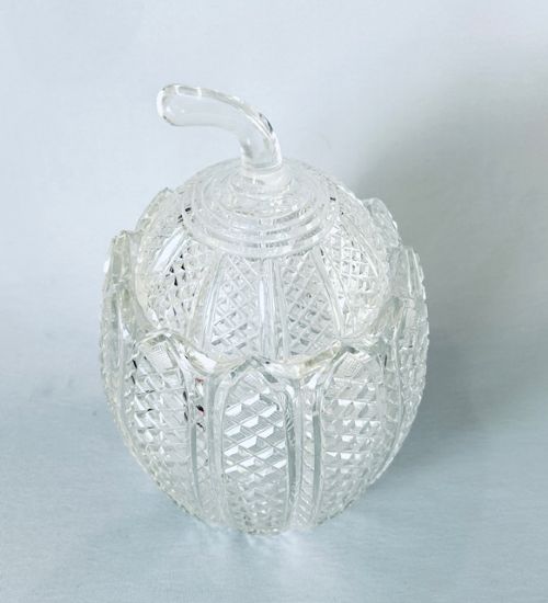 A Georgian clear cut-glass novelty biscuit barrel shaped like a melon with diamond cutting and a curved glass stem lid. View VIII