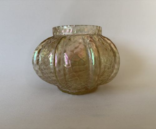 An Art Nouveau iridescent amber glass rose bowl featuring a lobed body and a hammered martele pattern finish. View III