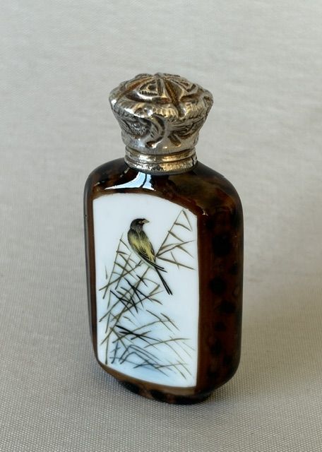 An Unusual Enamel Painted Silver Mounted Scent Bottle