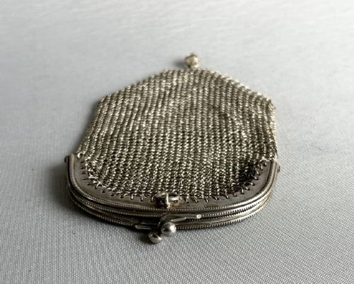 An antique French silver chain mail coin purse featuring a beaded kiss-lock clasp frame and suspension ring. View VI