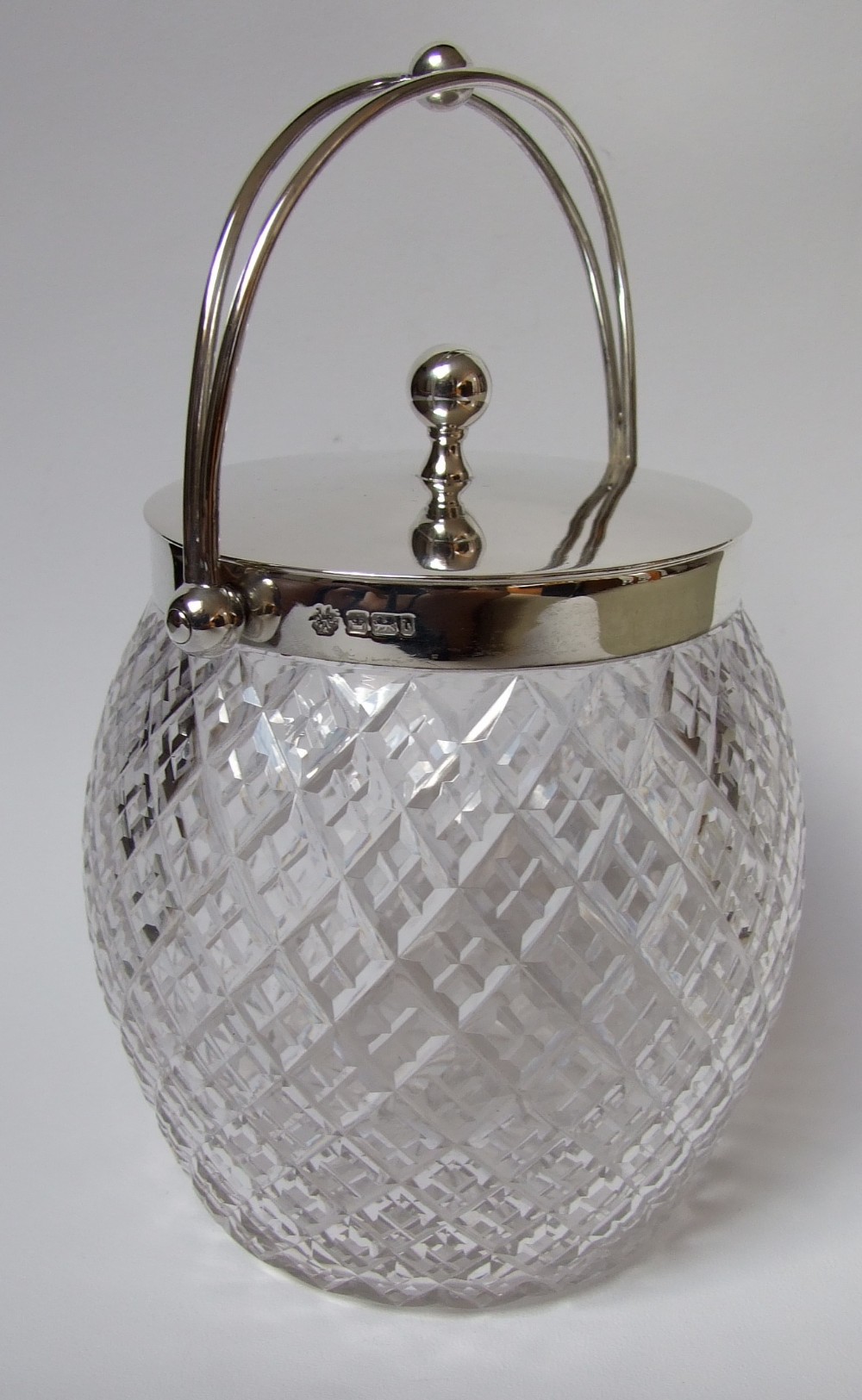 A splendid Edwardian silver mounted biscuit barrel.