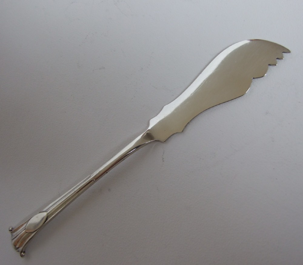 A rare Onslow pattern silver butter/cheese knife.