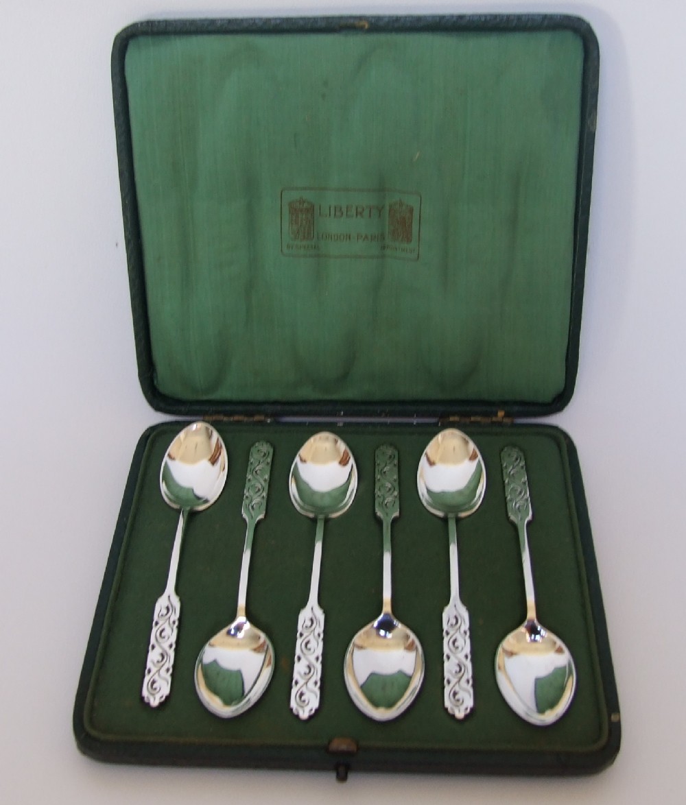 An extremely rare Liberty & Co. set of six silver coffee spoons in the original box.