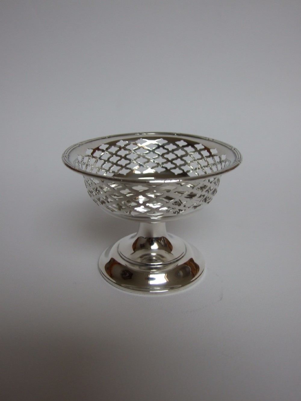 An attractive pierced silver pedestal bonbon dish.