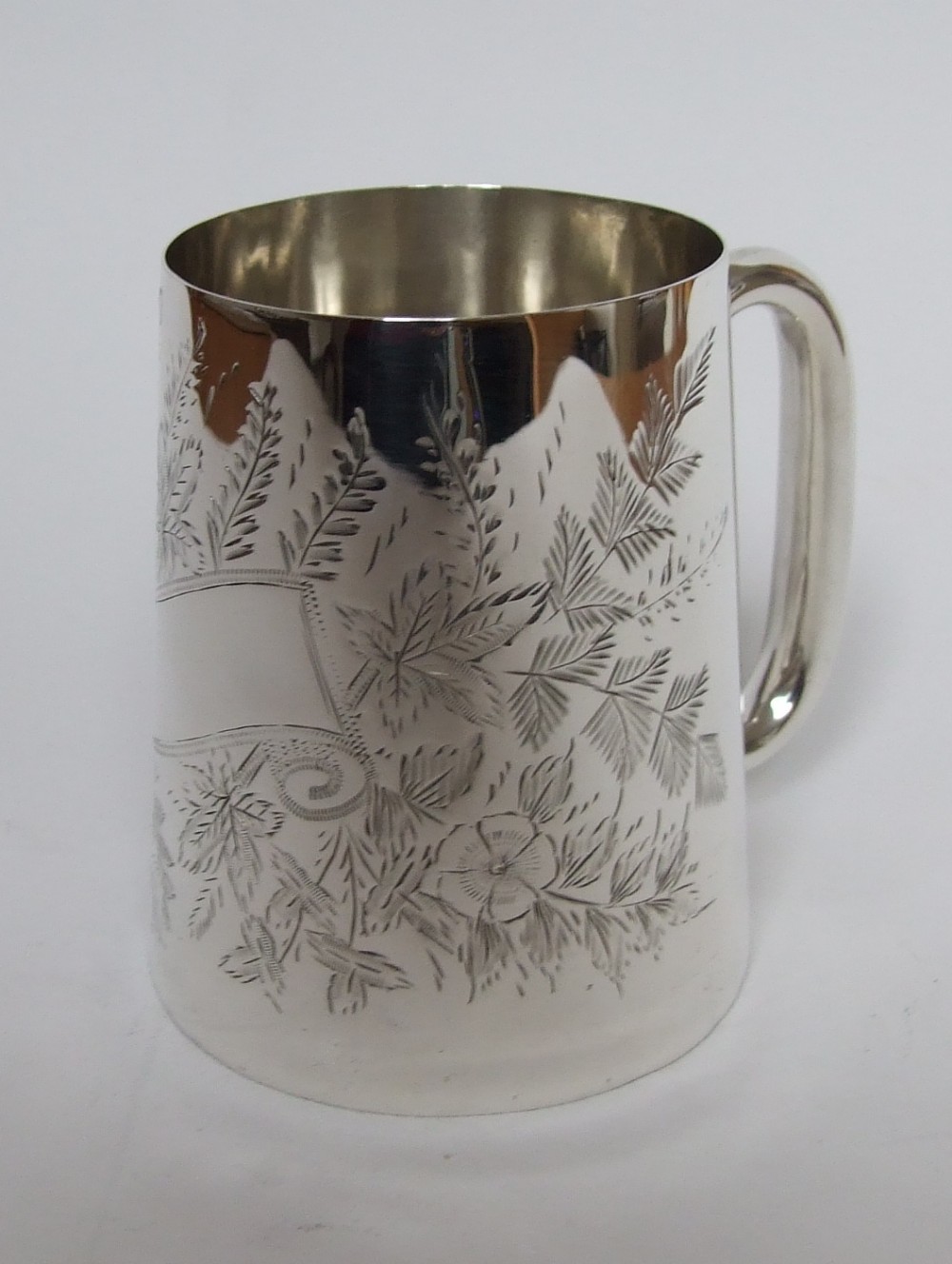 A charming Victorian engraved silver Christening mug.