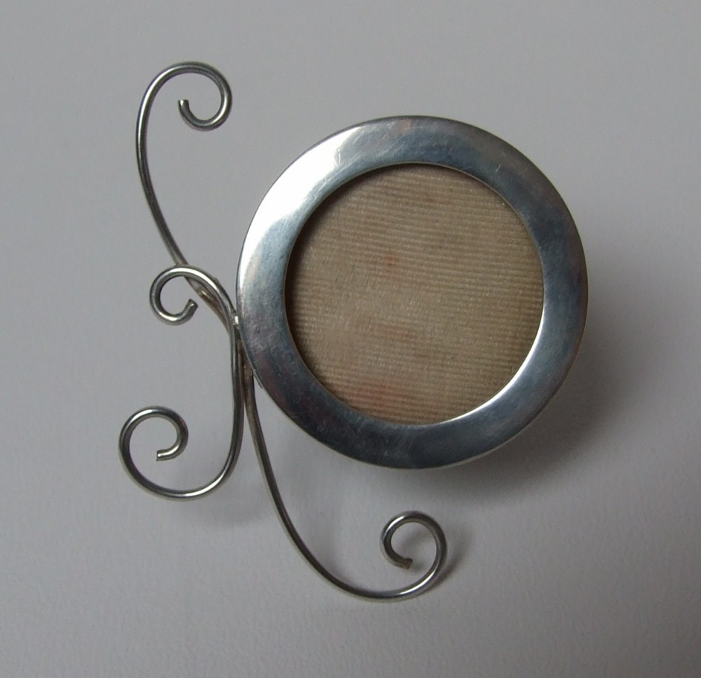 A delightful miniature Victorian silver photo frame.