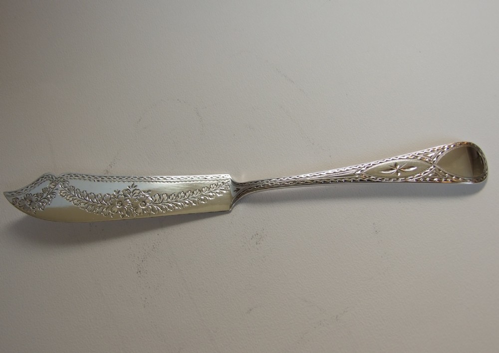 A lovely Edwardian engraved silver butter knife.