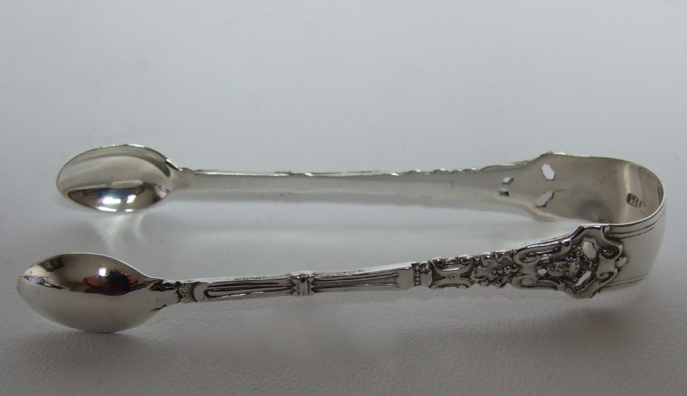 An unusual pair of Victorian silver sugar tongs.